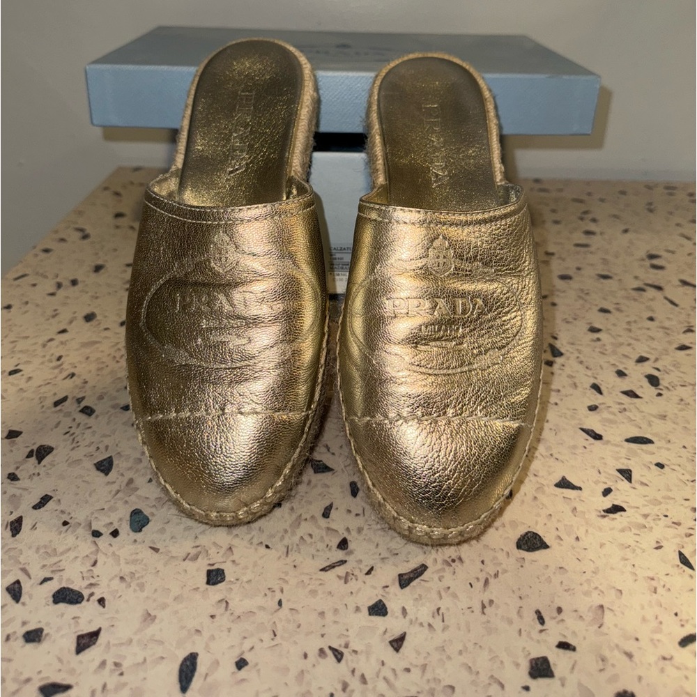 Prada gold espadrille mules 
Size 36 
Barely worn